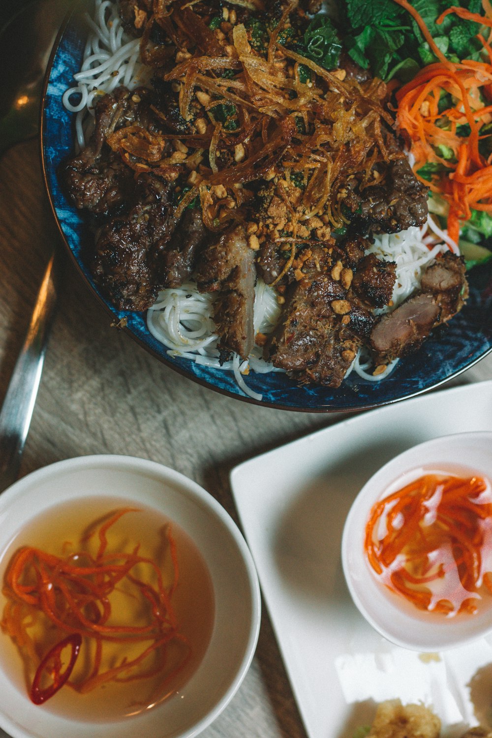 white ceramic bowl with red sauce