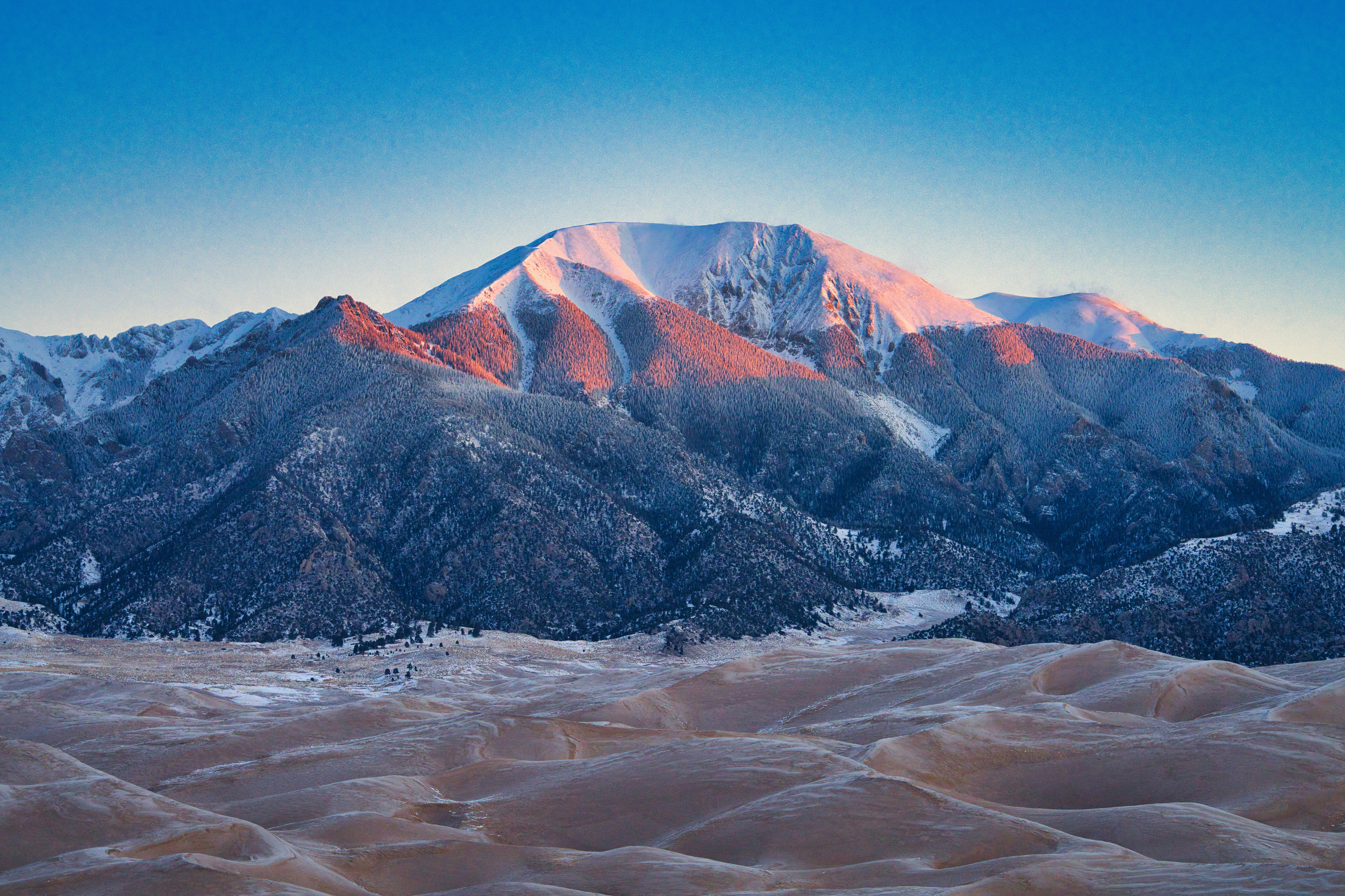 brown and green mountains under blue sky during daytime