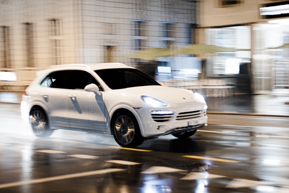 white honda car on road during night time