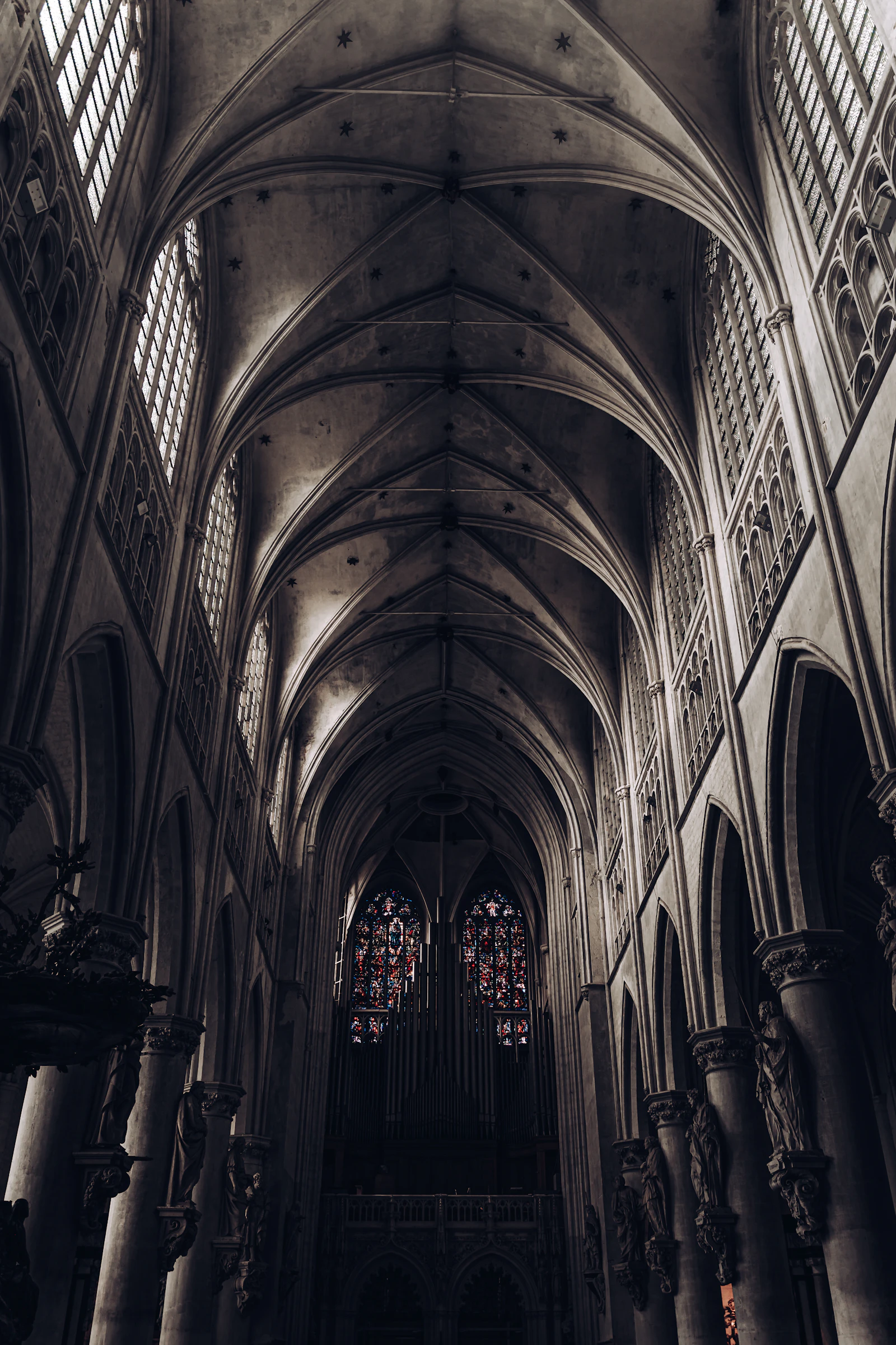 Interior of a Gothic cathedral with vaulted ceilings and arched architecture