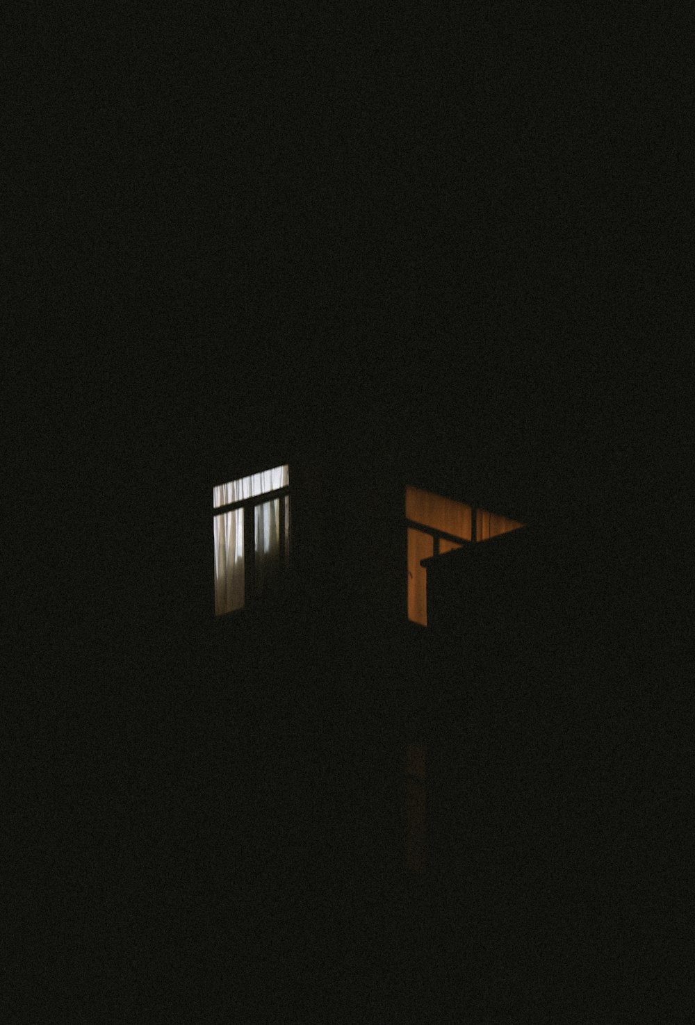 white and brown building during night time