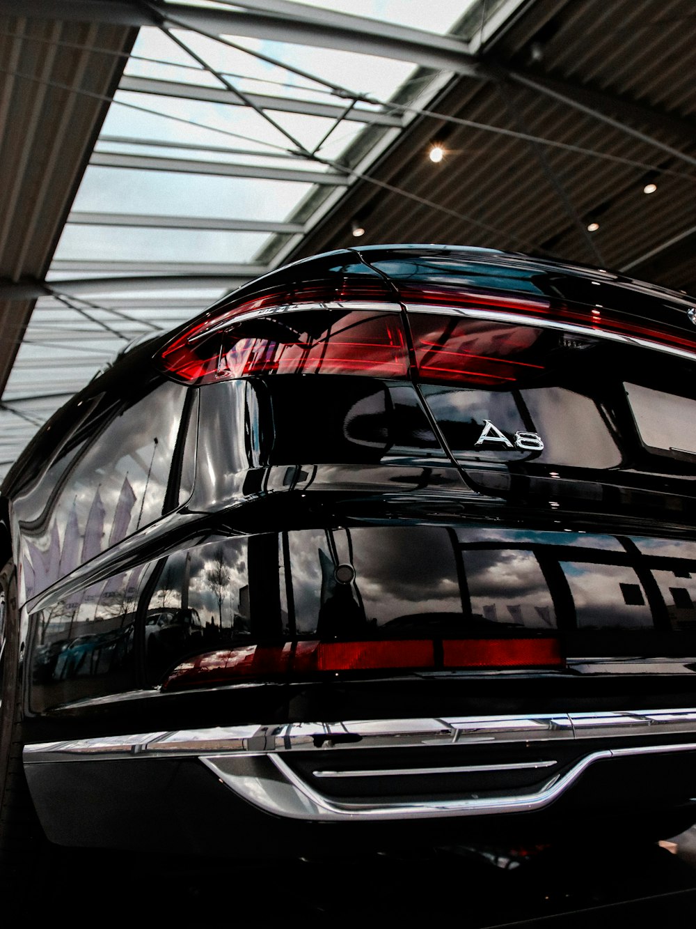 black and red car in a garage