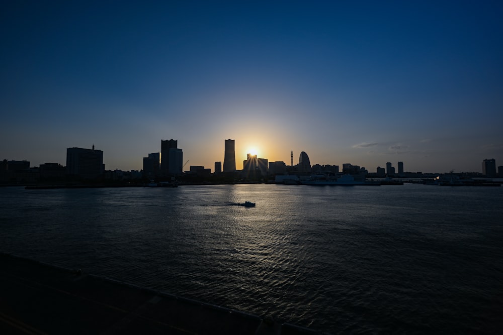 silhouette of city skyline during sunset