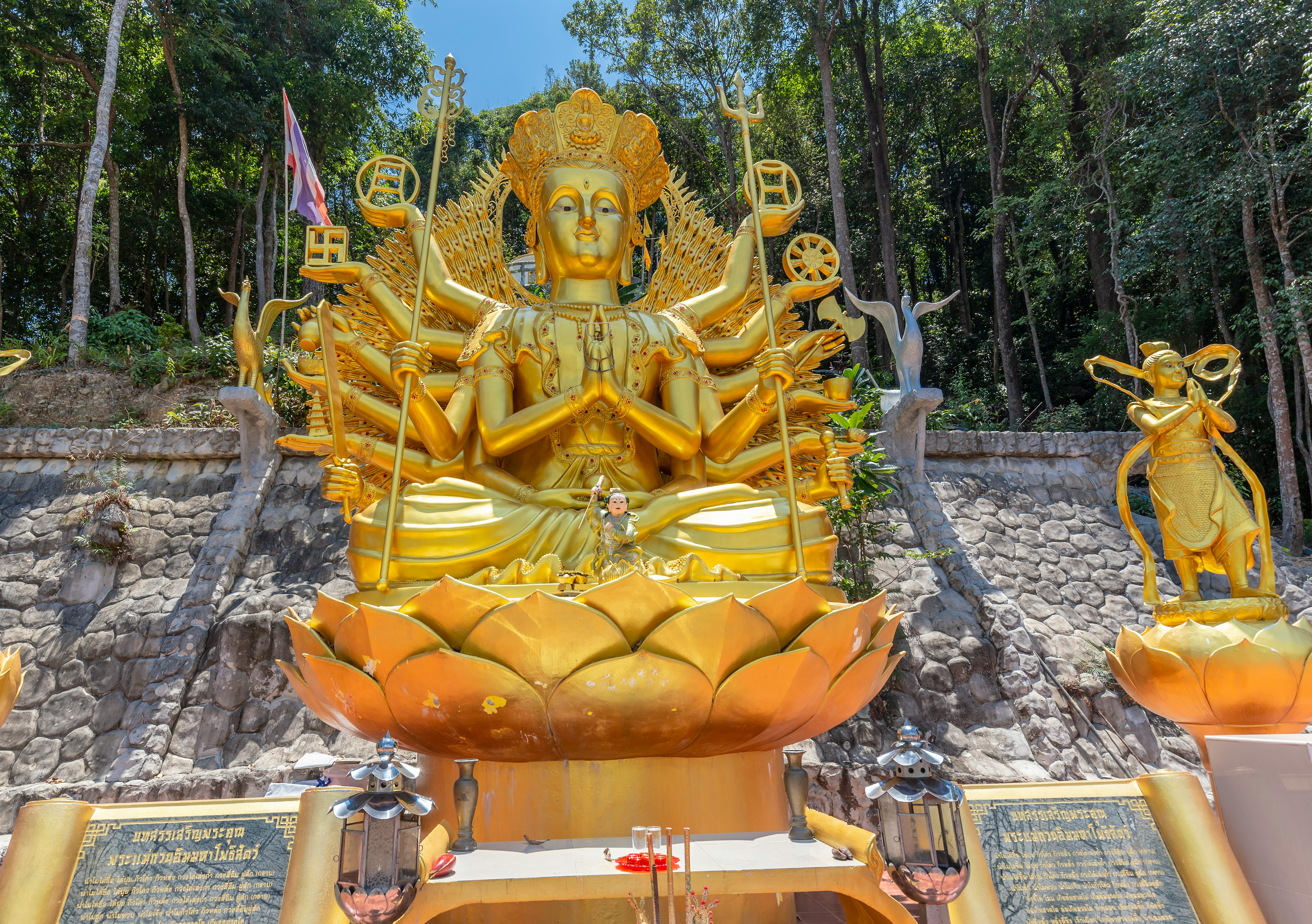 gold buddha statue during daytime