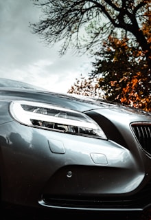 silver mercedes benz car near brown trees during daytime
