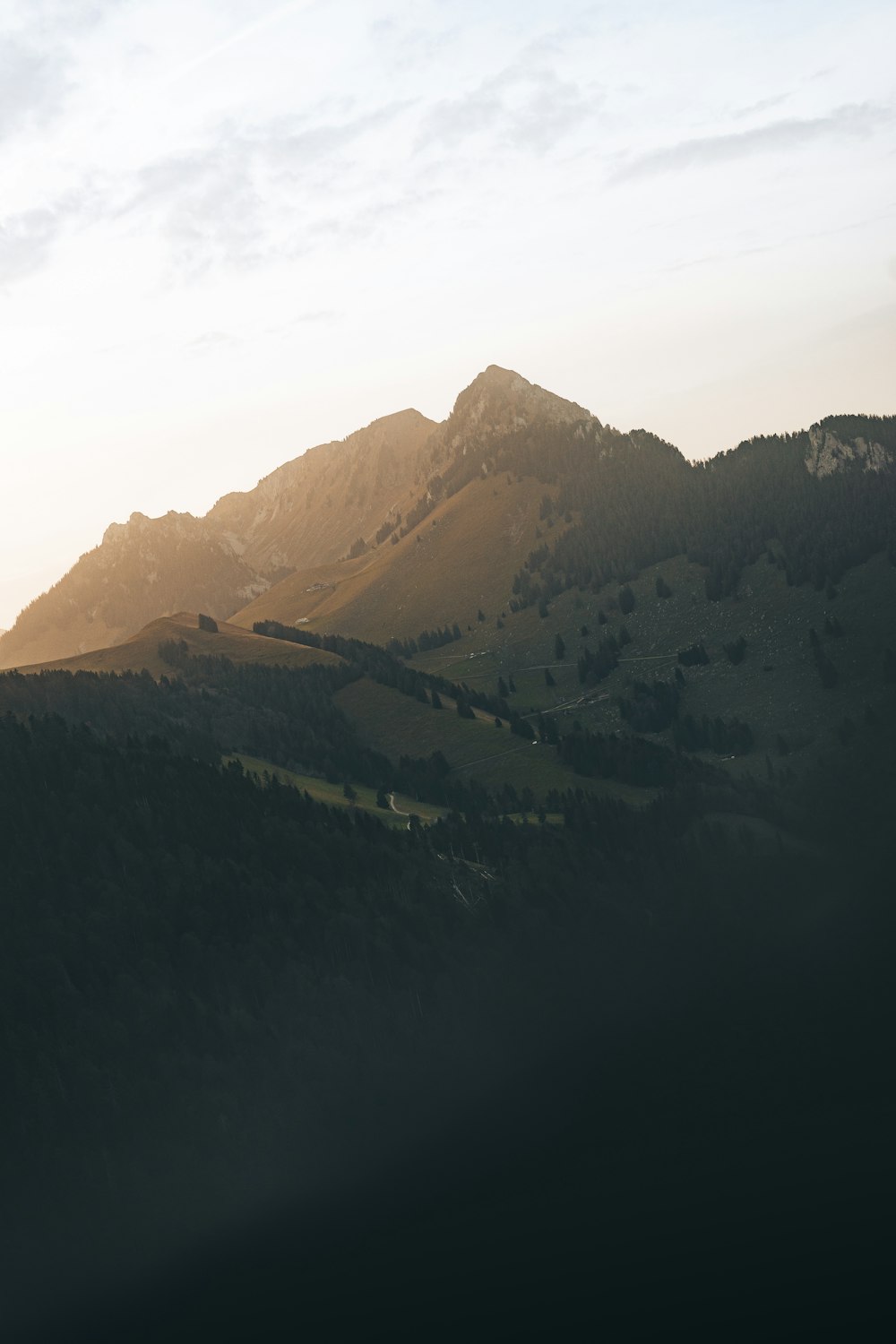 a view of a mountain range at sunset