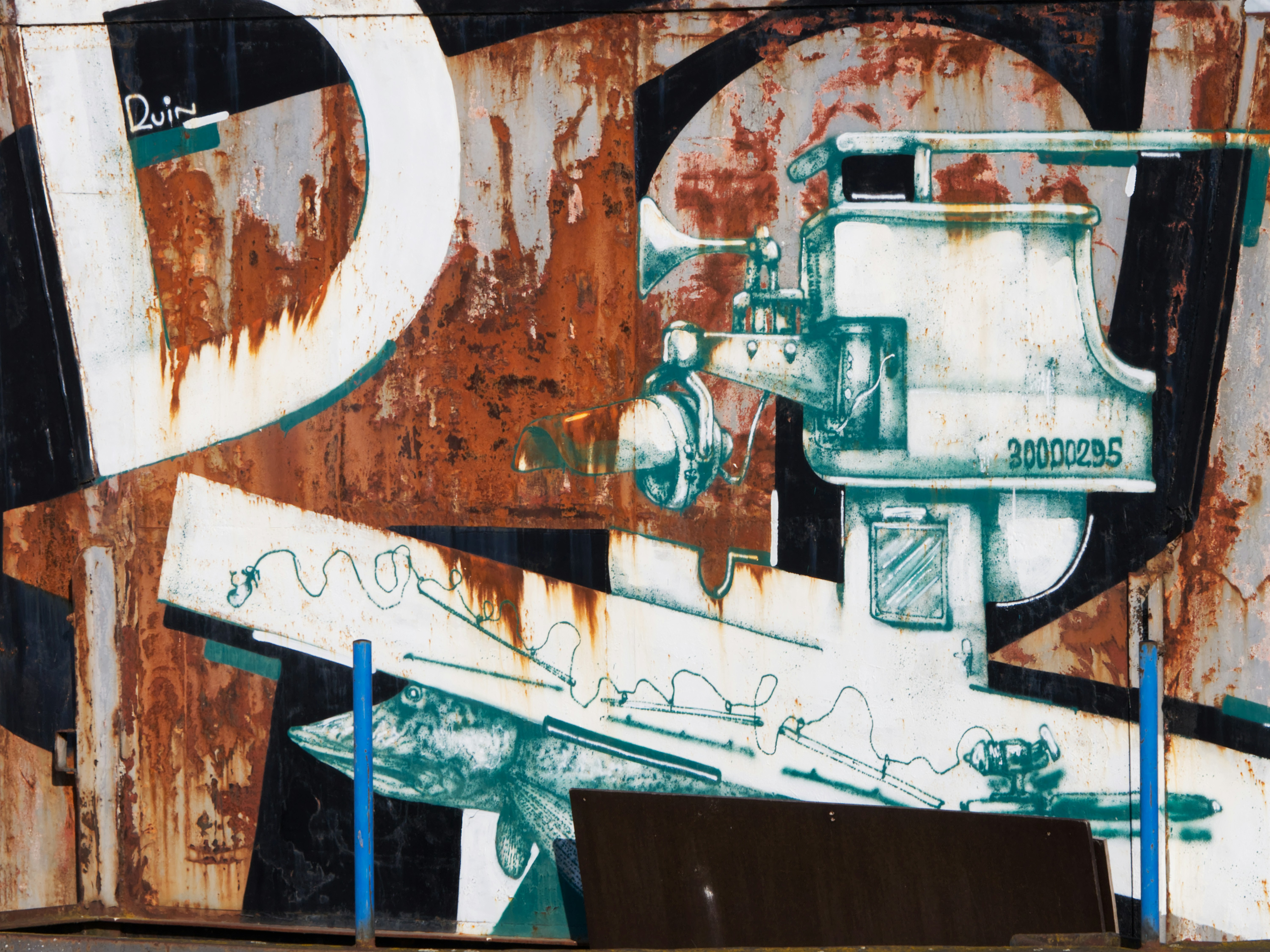 white and brown graffiti on wall