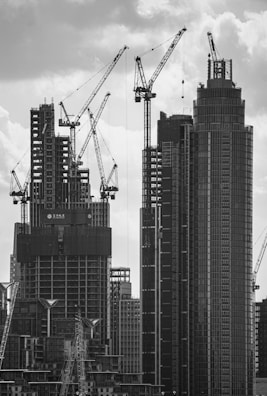 grayscale photo of high rise buildings