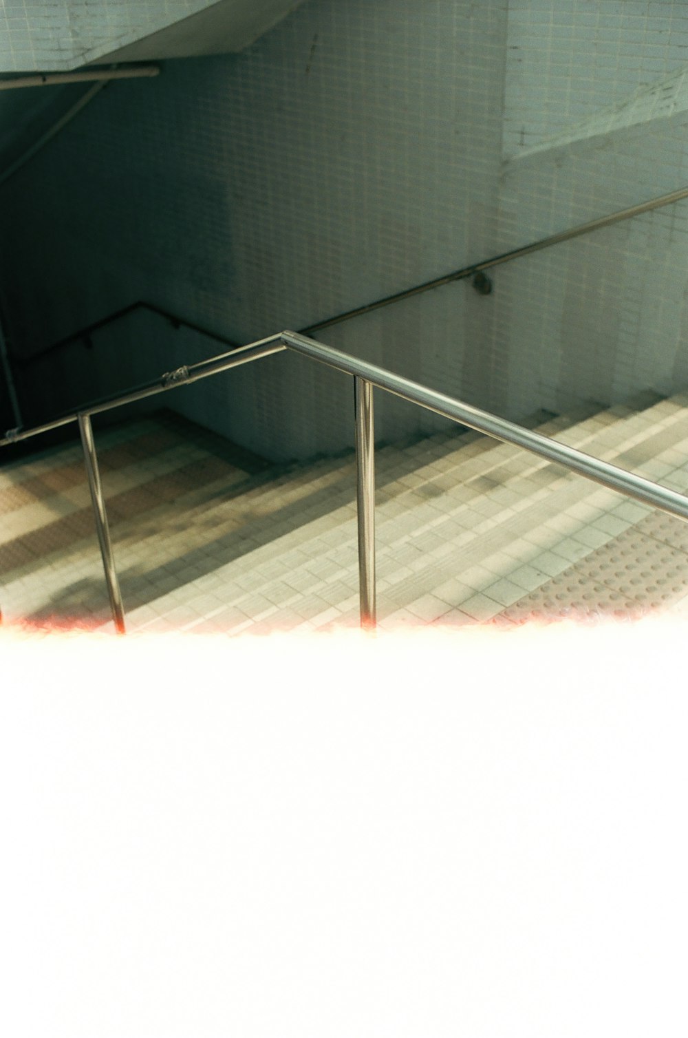 black metal railings on brown concrete floor