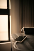 A smartphone screen showing fast charging progress in a cozy indoor setting.