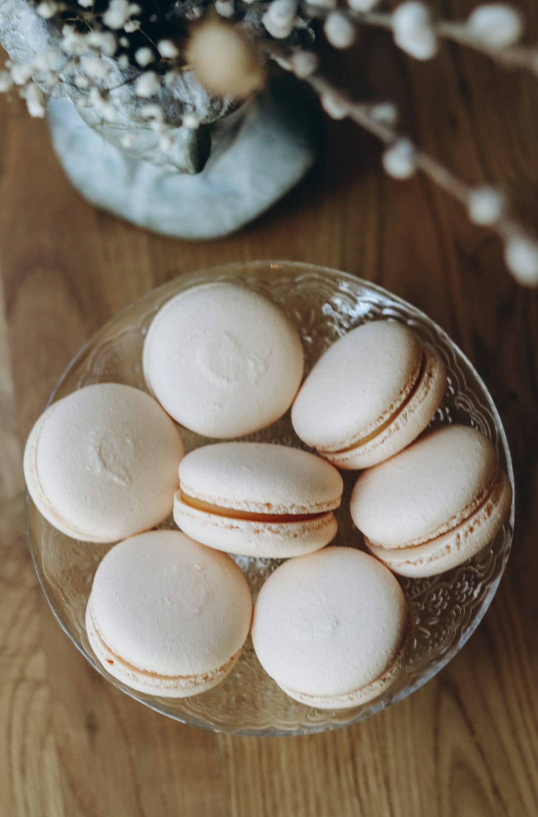 white and brown heart shaped cookies on clear glass bowl