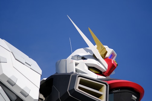 A large and clear image featuring three robots with a notebook.