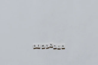white and yellow letter t