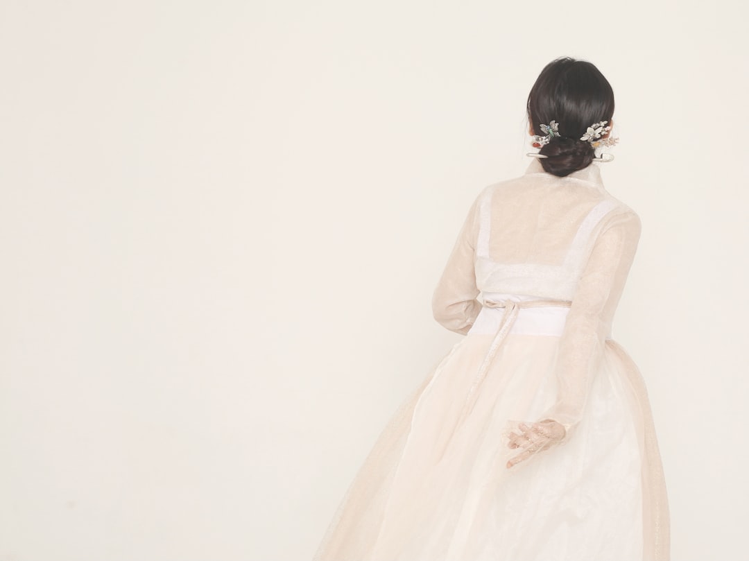woman in white wedding dress, Hanbok Korean Traditional Dress</p></figure><p>photographer_ Baek Gayeon (@__g_yn__)