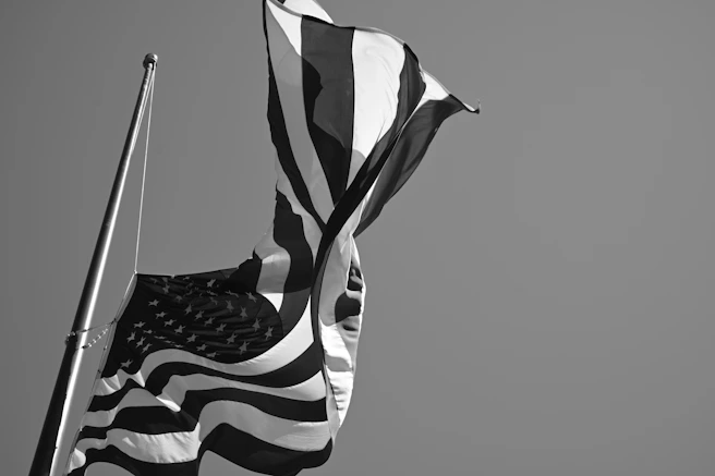 grayscale photo of us a flag