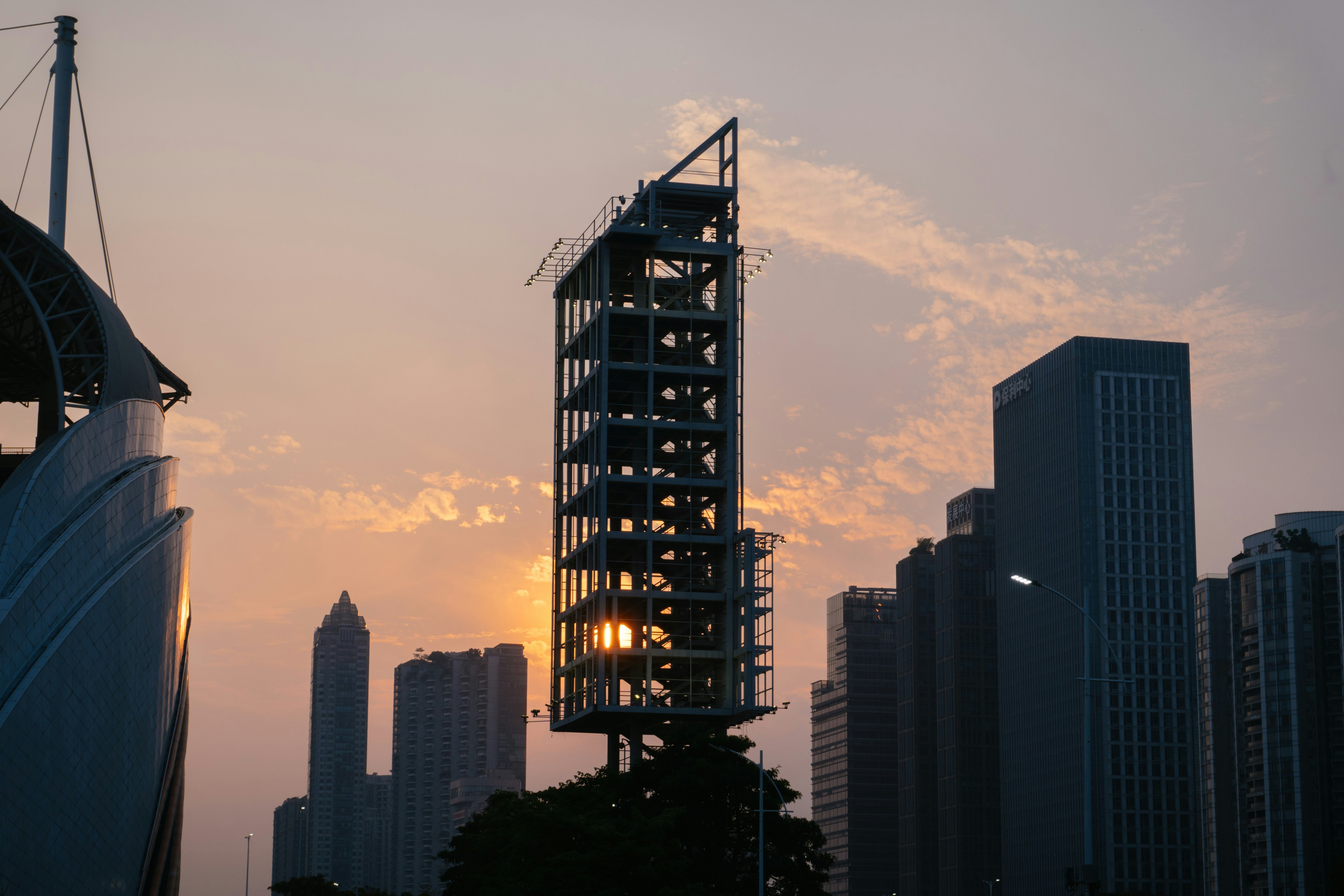 silhouette of city buildings during sunset