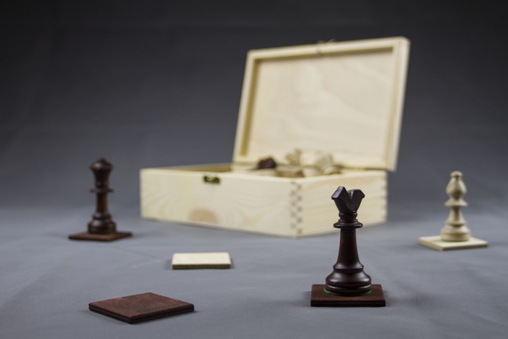 black chess piece on white table