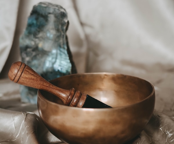 brown wooden spoon on brown round bowl