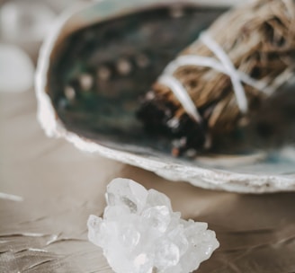 white flower on white ceramic bowl