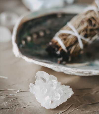 white flower on white ceramic bowl