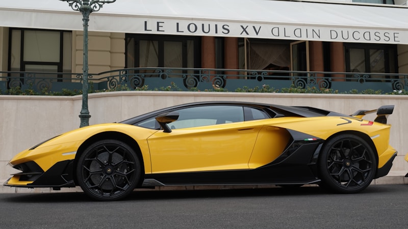 Yellow Ferrari in elite district
