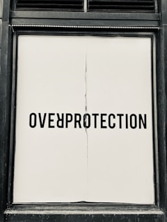 Large banner displayed outdoors with bold text and eye-catching visuals