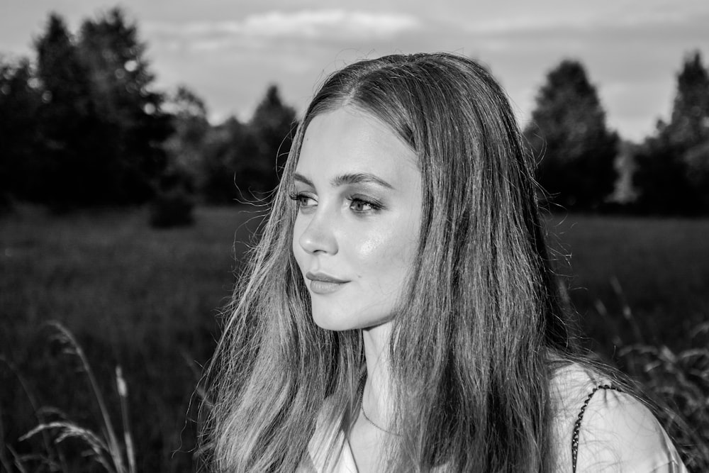 grayscale photo of woman in white shirt