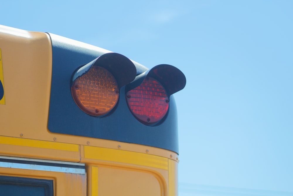 yellow and black train under blue sky during daytime