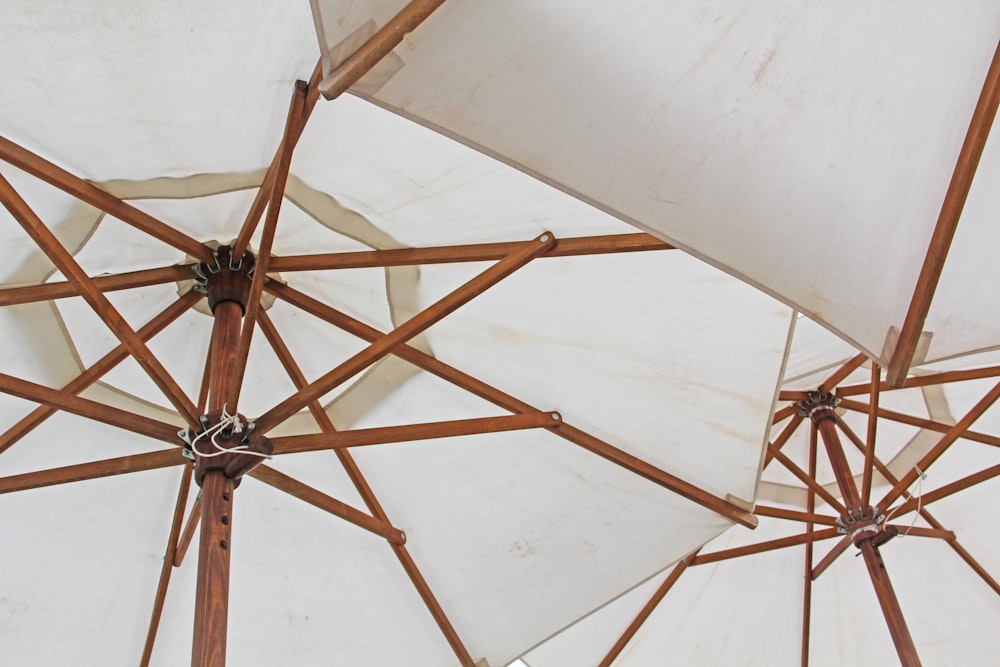 brown wooden frame with white umbrella