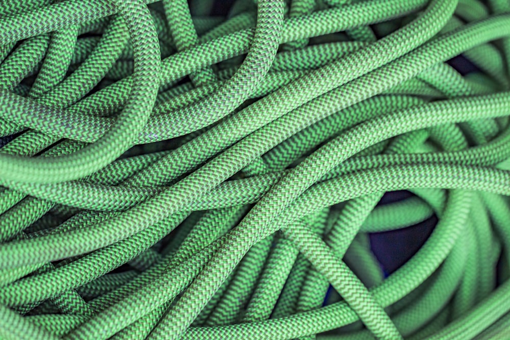 green rope on blue textile