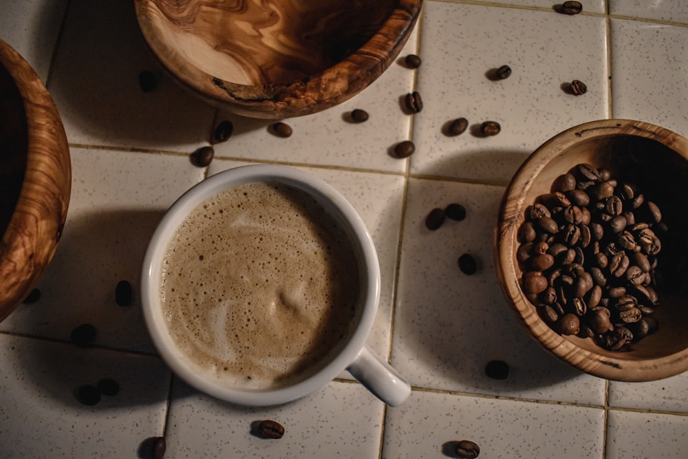 white ceramic mug with coffee