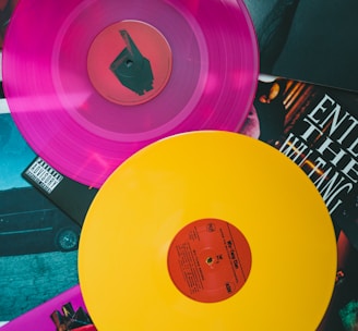 purple vinyl record on black and white table