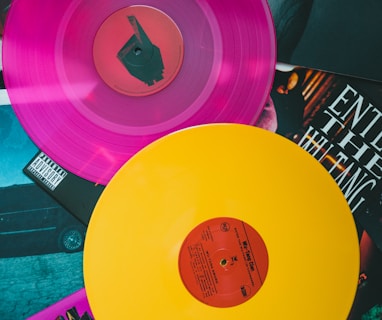 purple vinyl record on black and white table