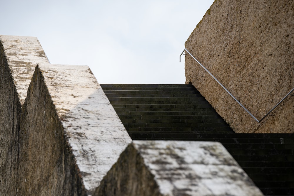 gray concrete wall under blue sky during daytime