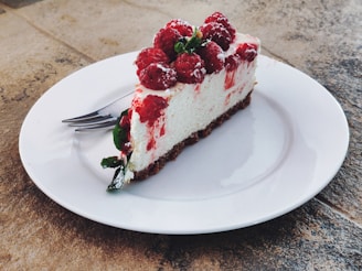 strawberry cake on white ceramic plate