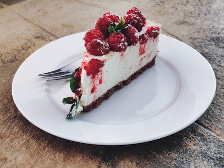 strawberry cake on white ceramic plate