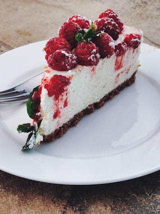 strawberry cake on white ceramic plate