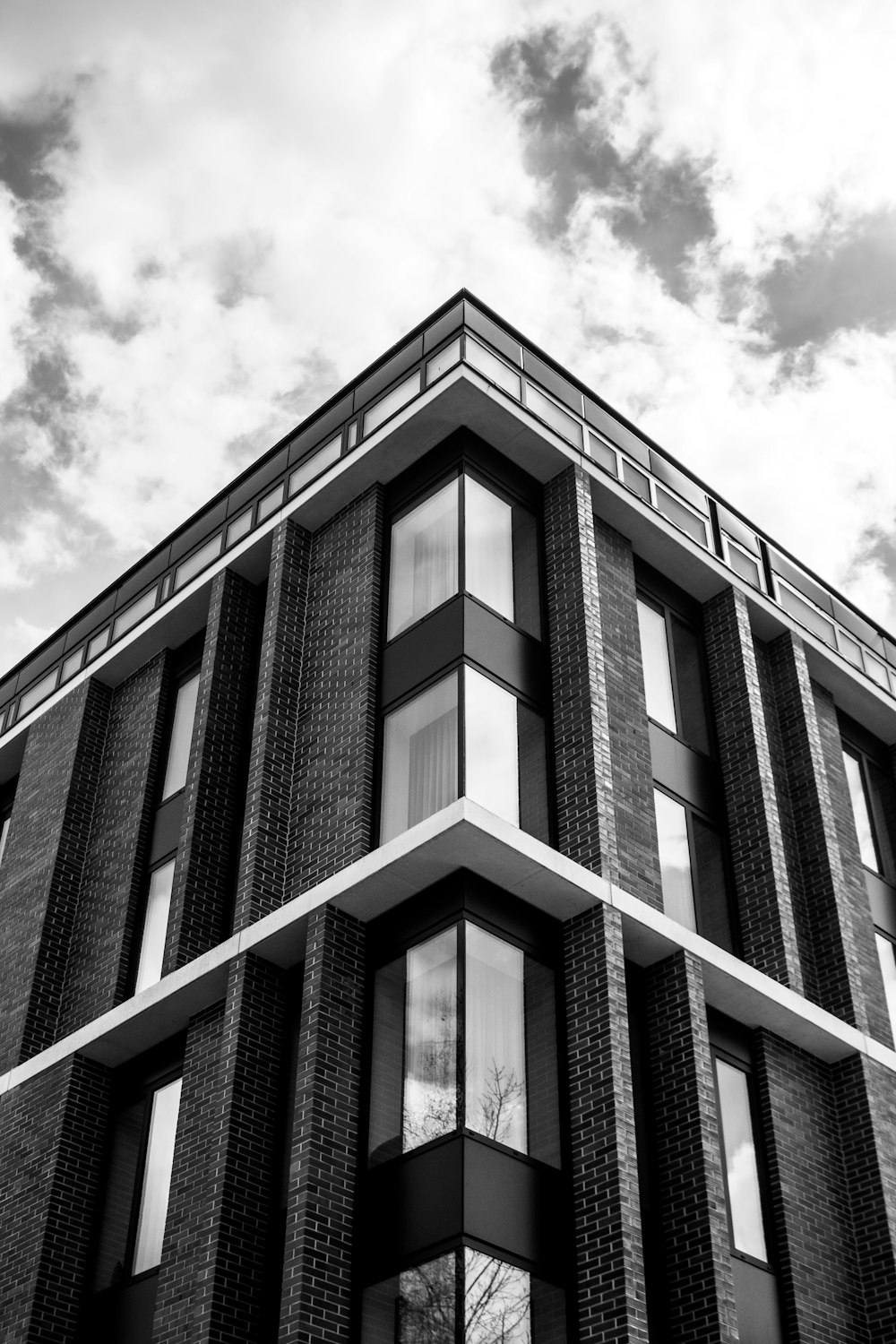 grayscale photo of concrete building