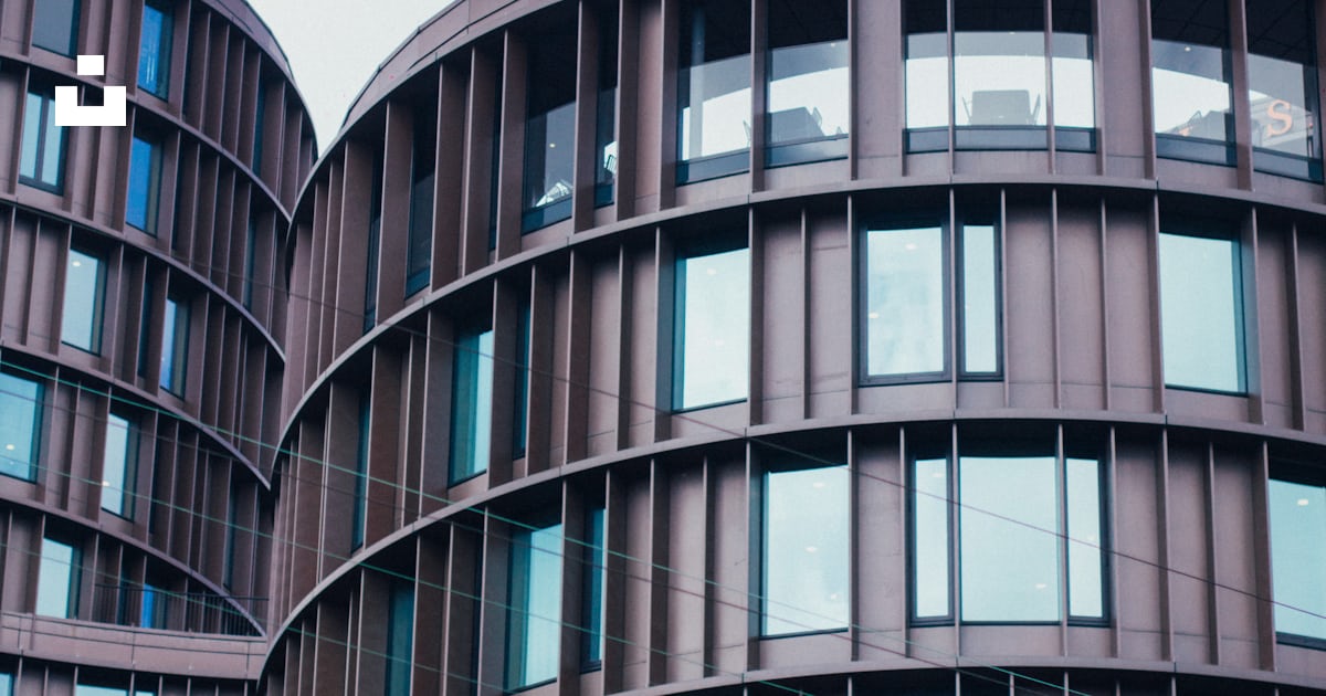 Gray concrete building under white clouds during daytime photo – Free ...