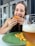 A happy customer enjoying a delicious meal prepared using brfer recipes.