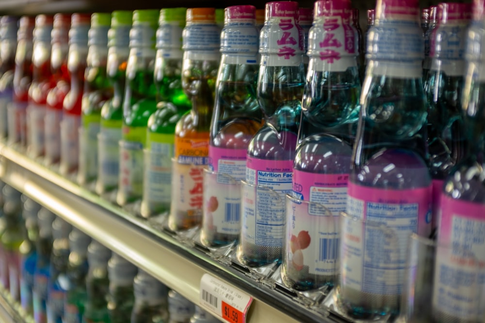 pink and blue labeled bottles