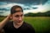 man in black crew neck shirt wearing black knit cap
