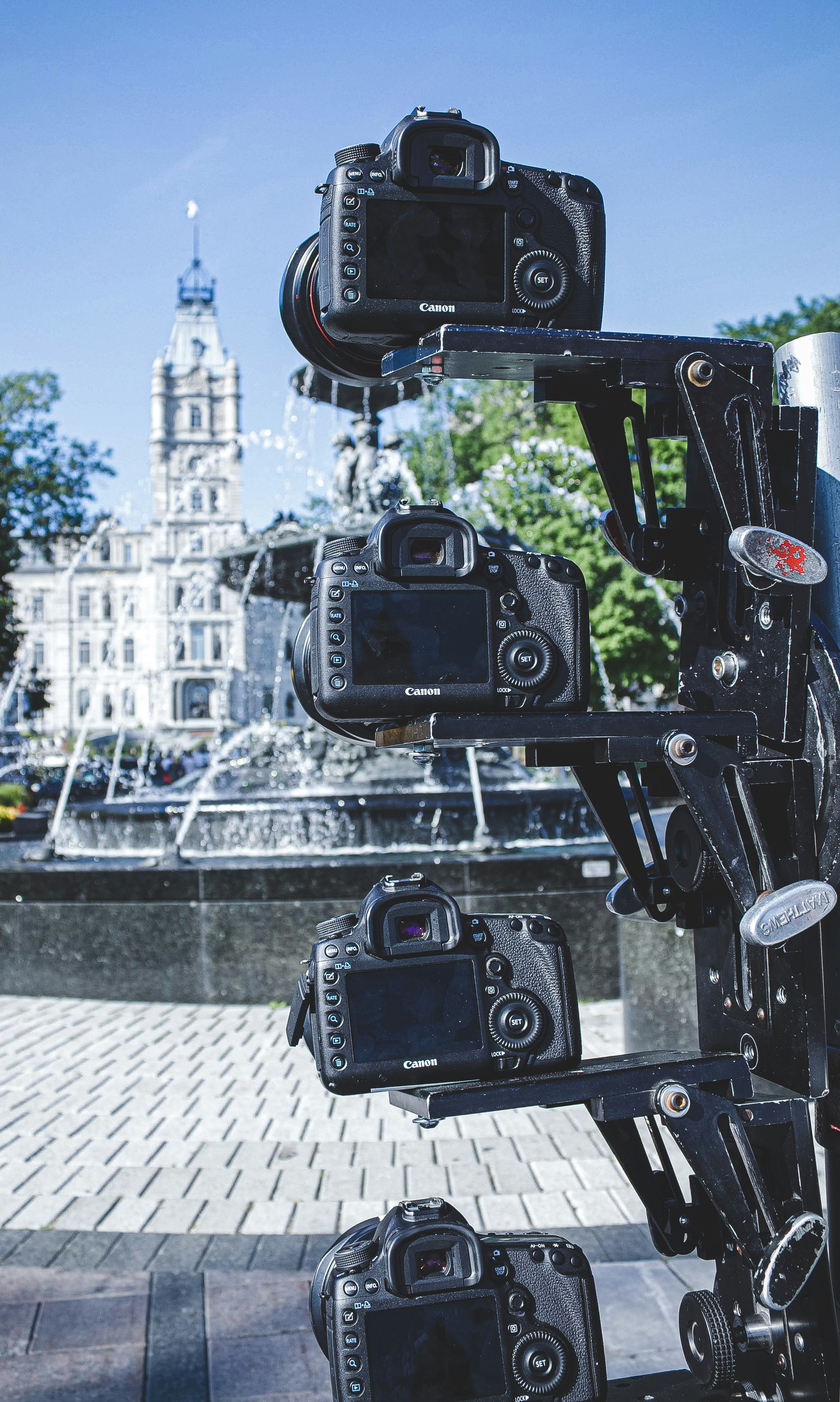 black camera on black metal stand