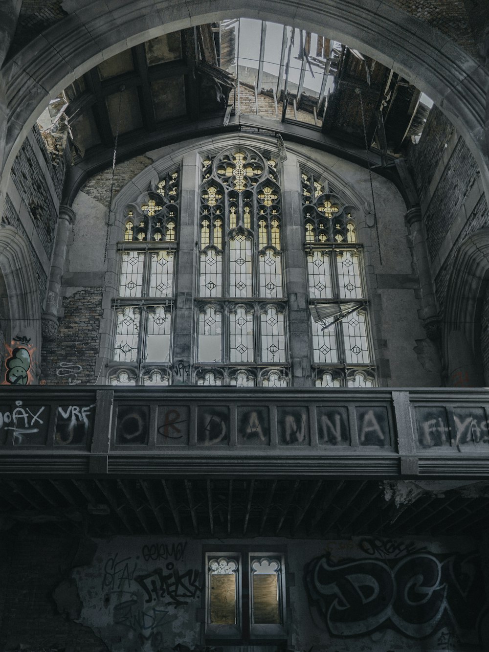 people walking inside building with glass windows