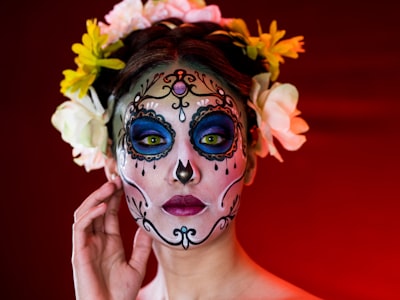 woman with white and pink floral face paint day of the dead google meet background