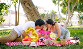 A family picnic scene with smiles and laughter.