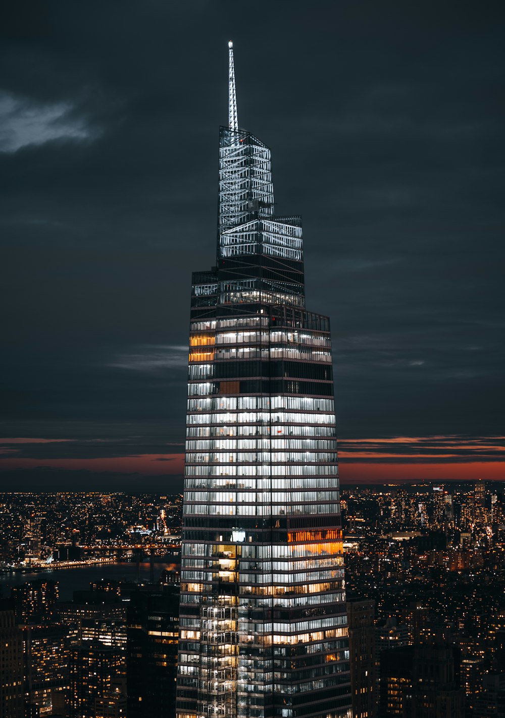 black and white high rise building during night time