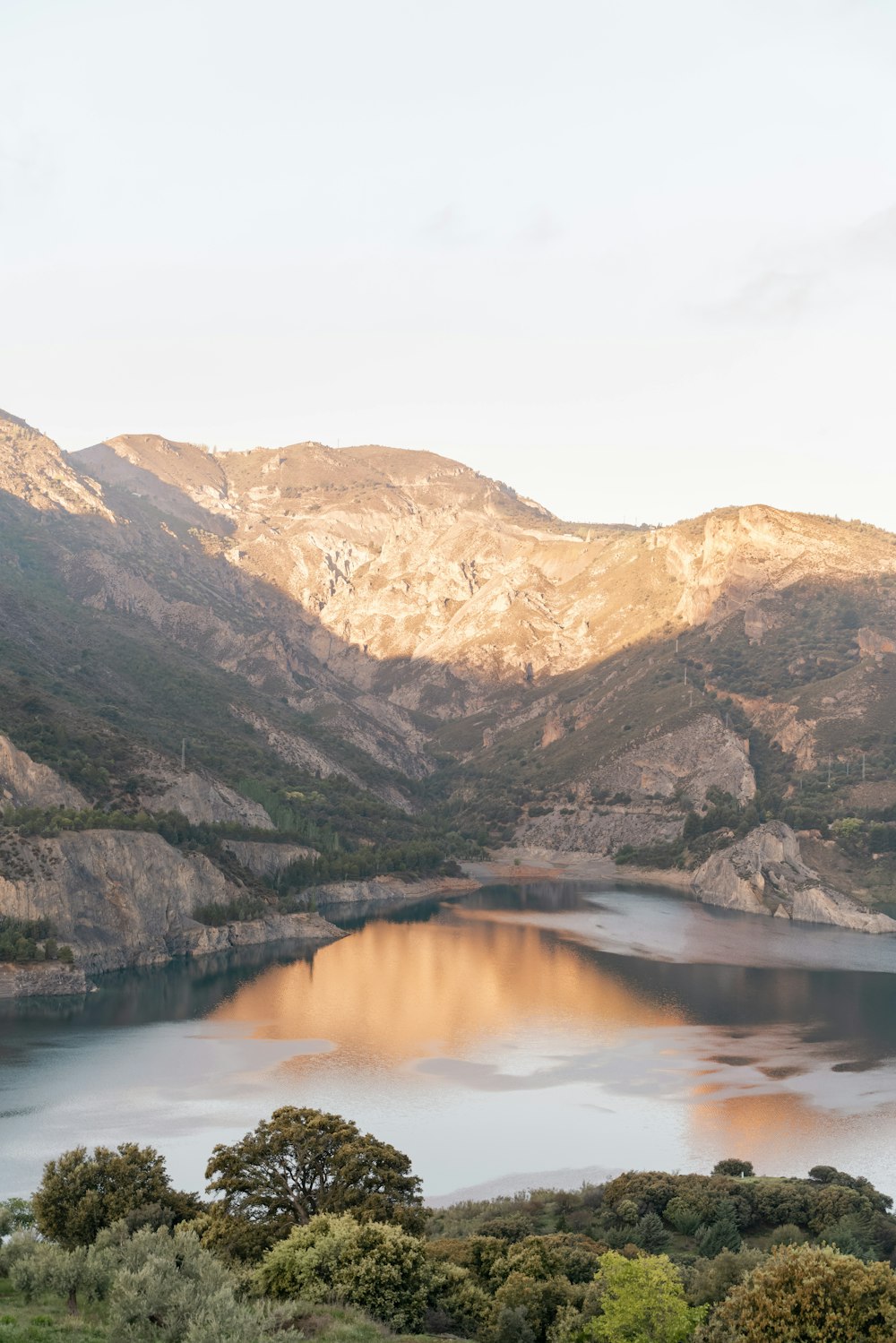 lake in the middle of mountains