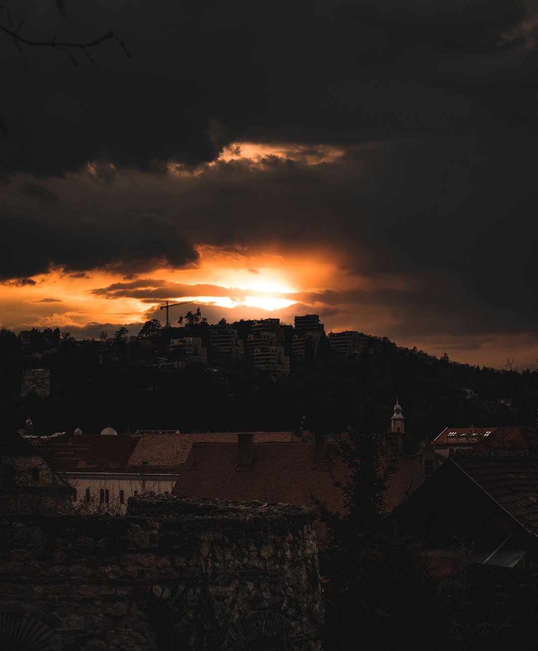 silhouette of city buildings during sunset