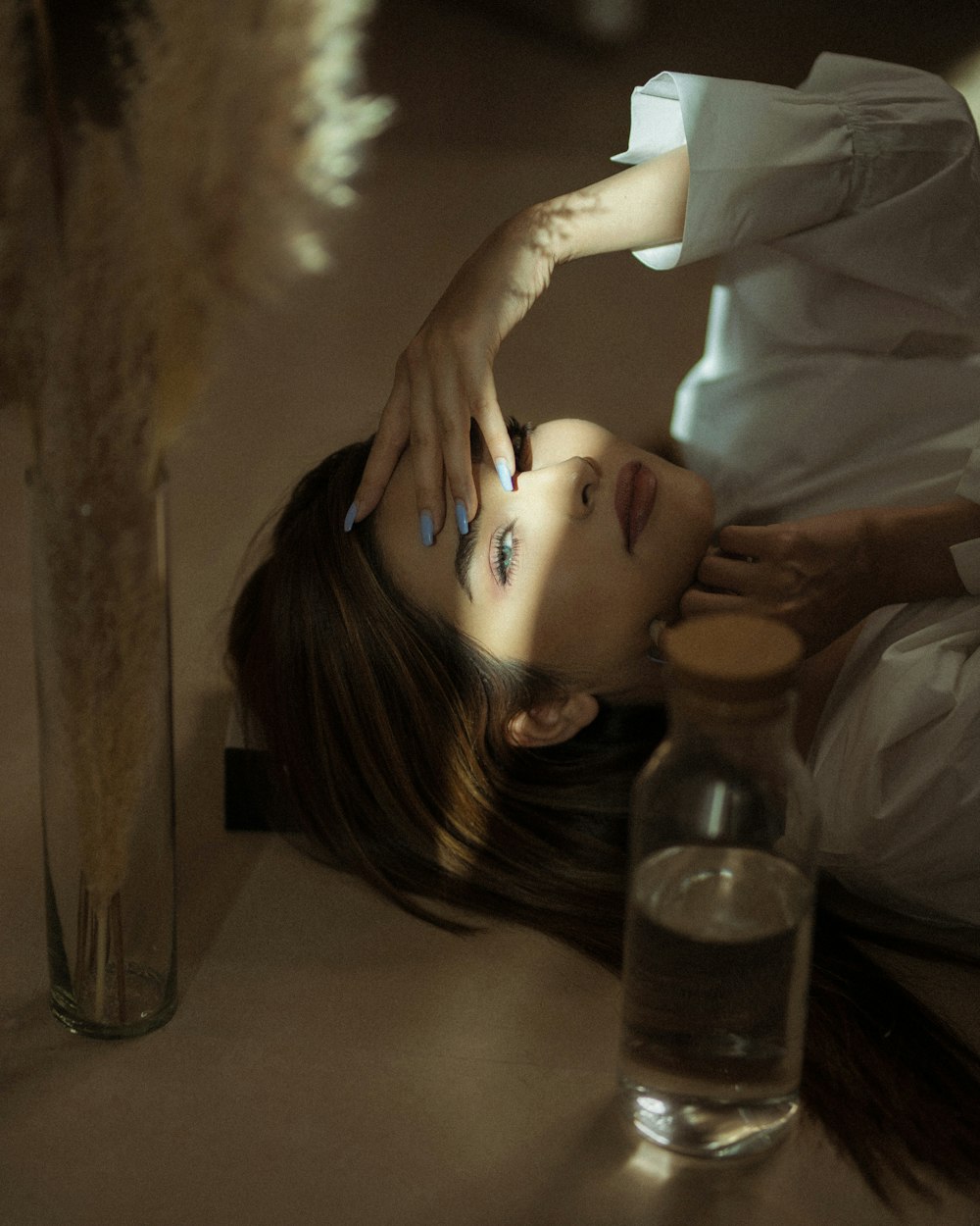 woman in white long sleeve shirt